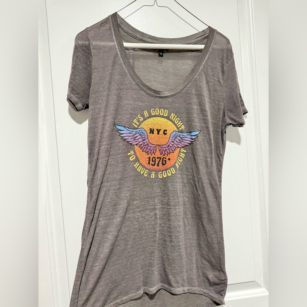 Express lightweight graphic tee. Soft and flowy. Never worn. Size XS